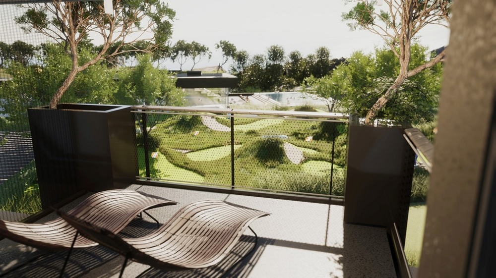 Terrasse avec bains de soleil et garde-corps en verre dans la verdure
