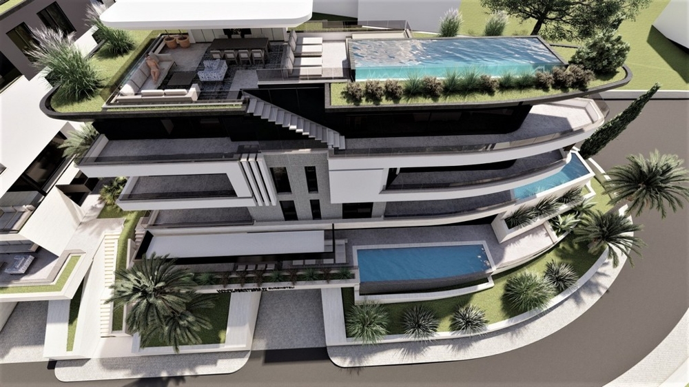 Piscine à débordement et toit-terrasse d'un bien neuf exclusif