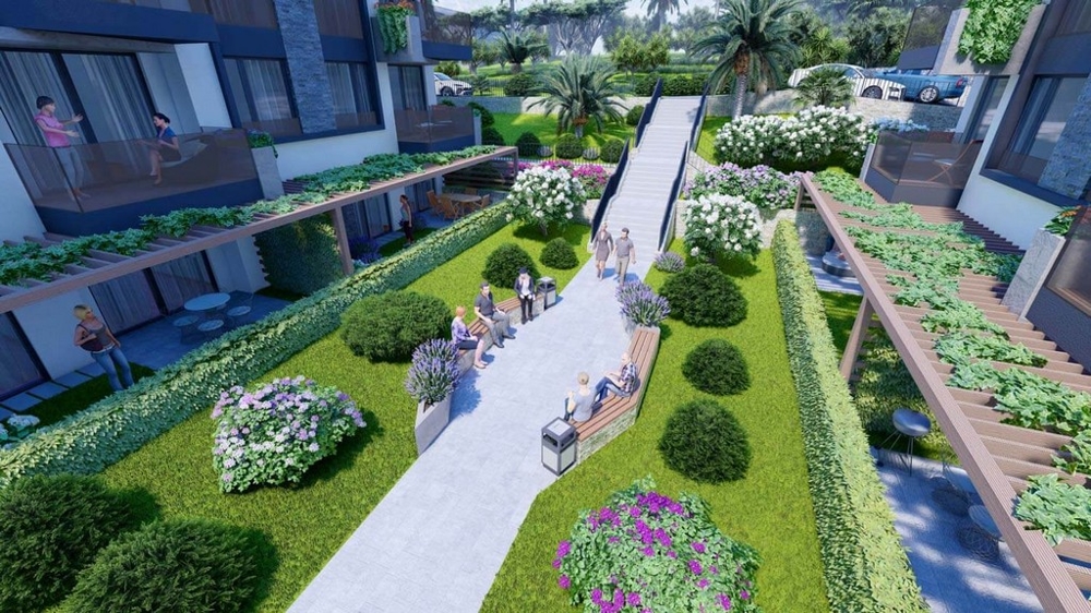 Jardin joliment aménagé avec aire de jeux