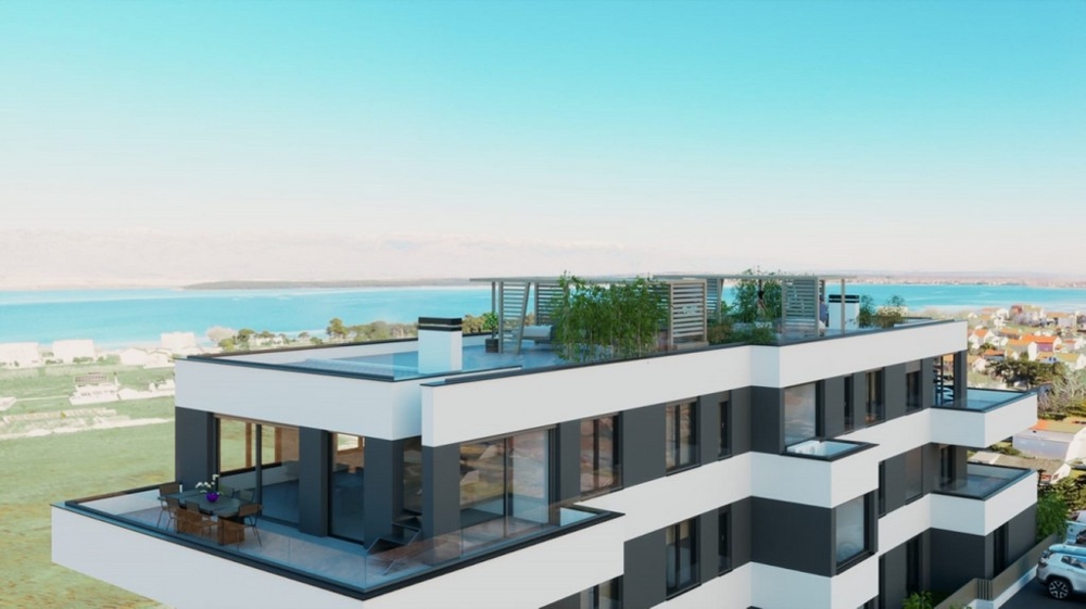 Toit-terrasse avec pergola et vue sur la mer