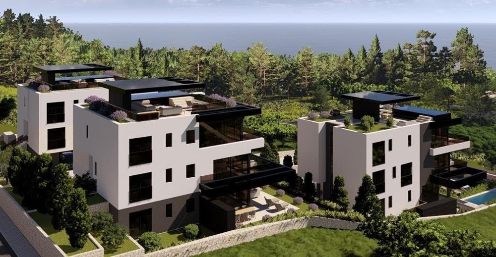 Vue à vol d'oiseau sur un ensemble de villas haut de gamme en Croatie avec jardins sur les toits, près de la côte – biens de luxe Croatie.