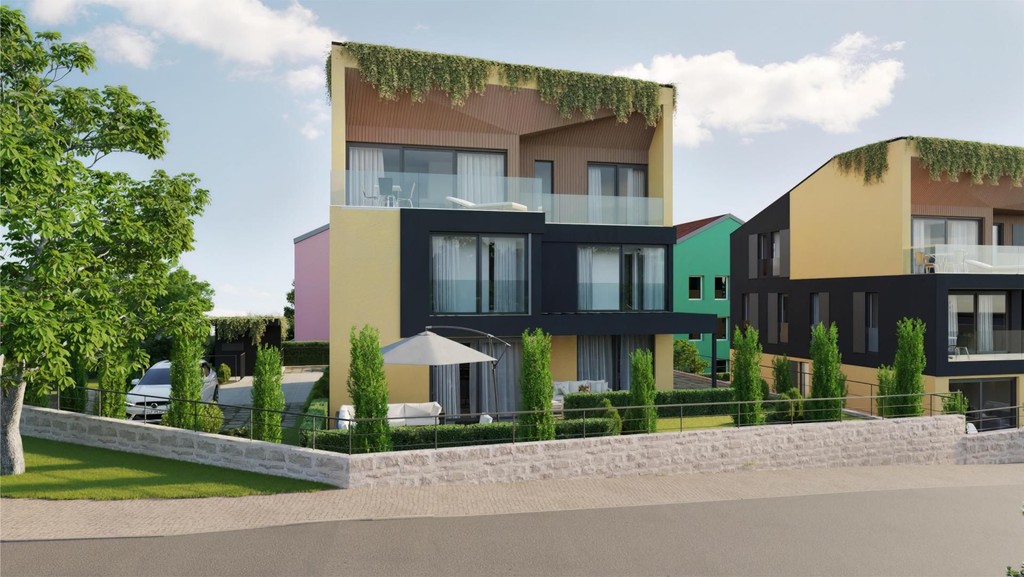 Villa urbaine avec toit végétalisé, balcon en verre et terrasse de jardin