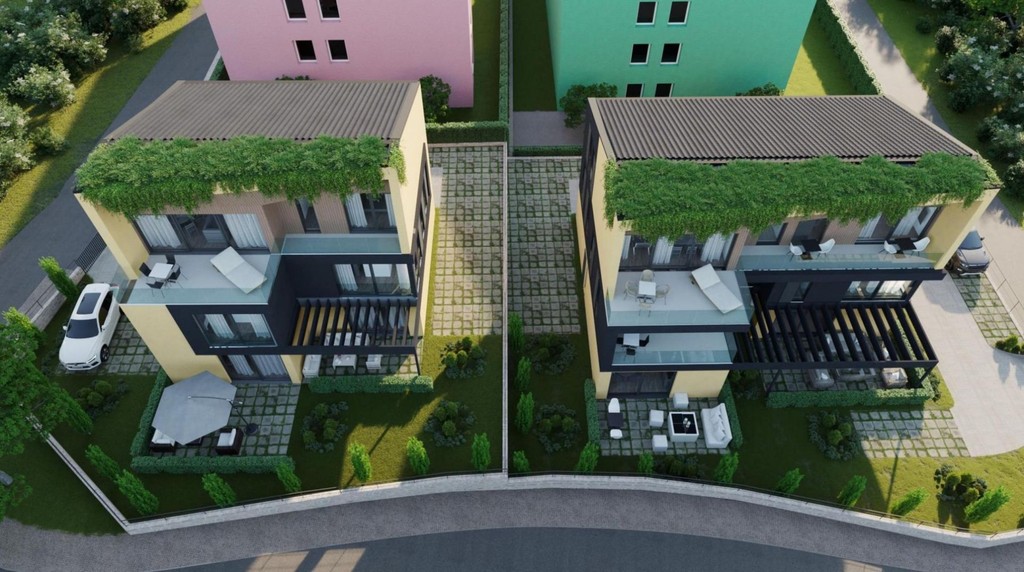 Vue aérienne de deux villas urbaines avec terrasses et jardins