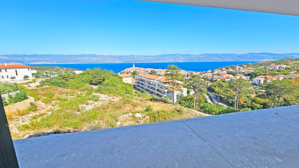 Vue mer depuis la terrasse sur Vrbnik et le golfe du Kvarner - appartement A3479 sur l'île de Krk
