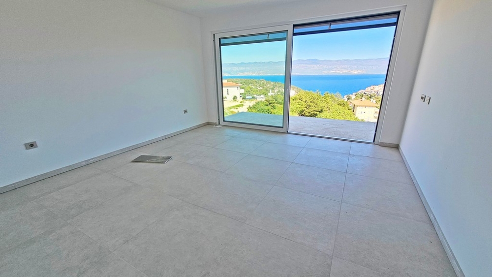 Salon avec grande porte coulissante donnant sur la terrasse et vue mer, construction neuve A3481 sur Krk