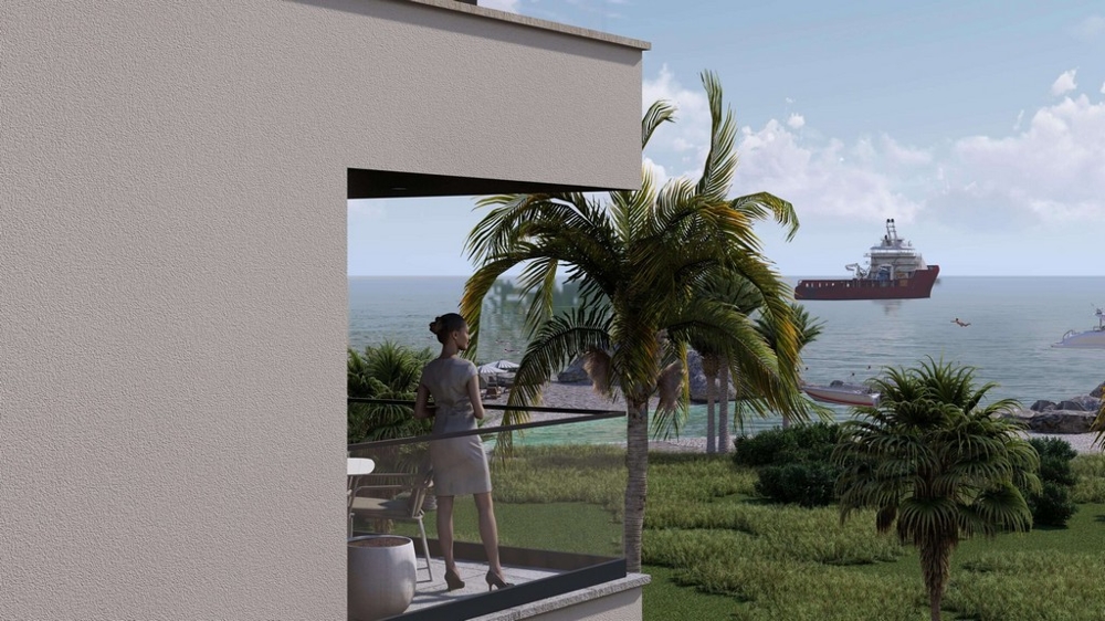 Balcon avec vue sur la mer et les palmiers