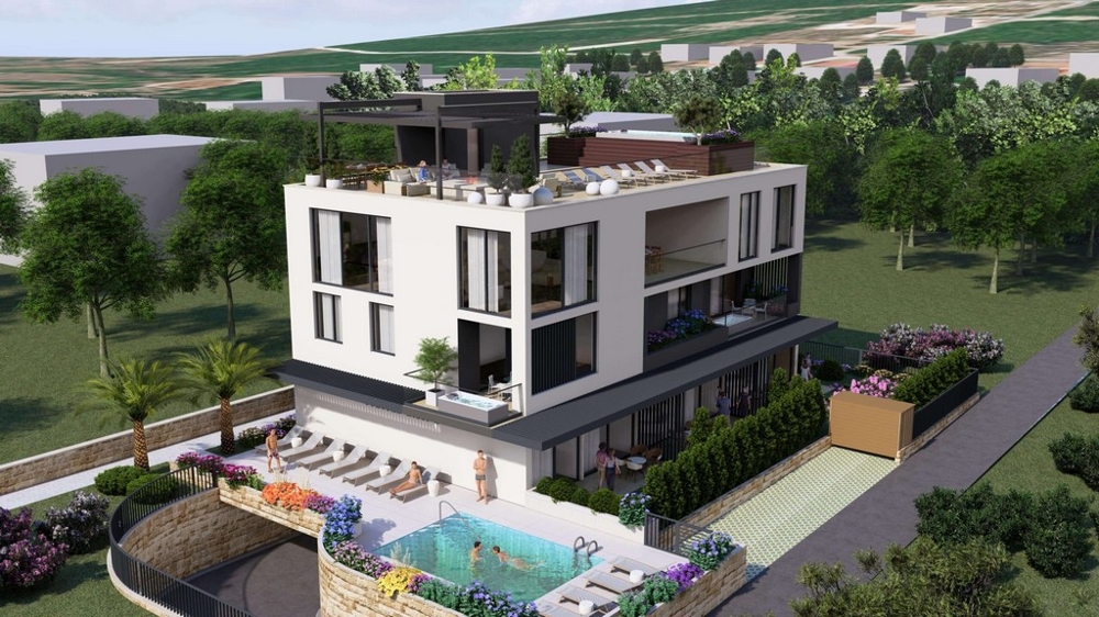 Immeuble d'habitation avec piscine et environnement verdoyant