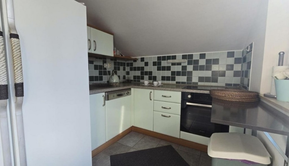Cuisine moderne de l'appartement A3545, à vendre sur l'île de Pag.