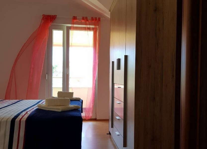 Chambre avec accès au balcon