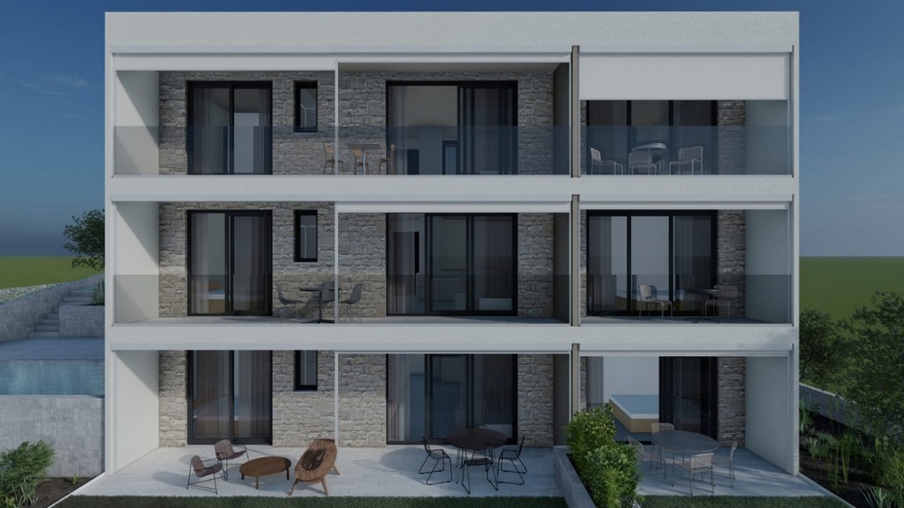 Immeuble neuf sur trois niveaux avec balcons à Stomorska