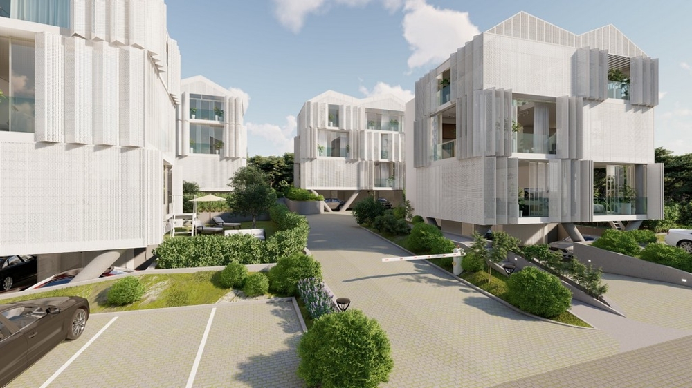 Visualisation des maisons aux façades à lames le long du chemin