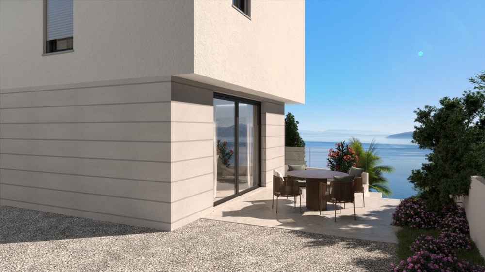 Terrasse avec coin salon et vue mer