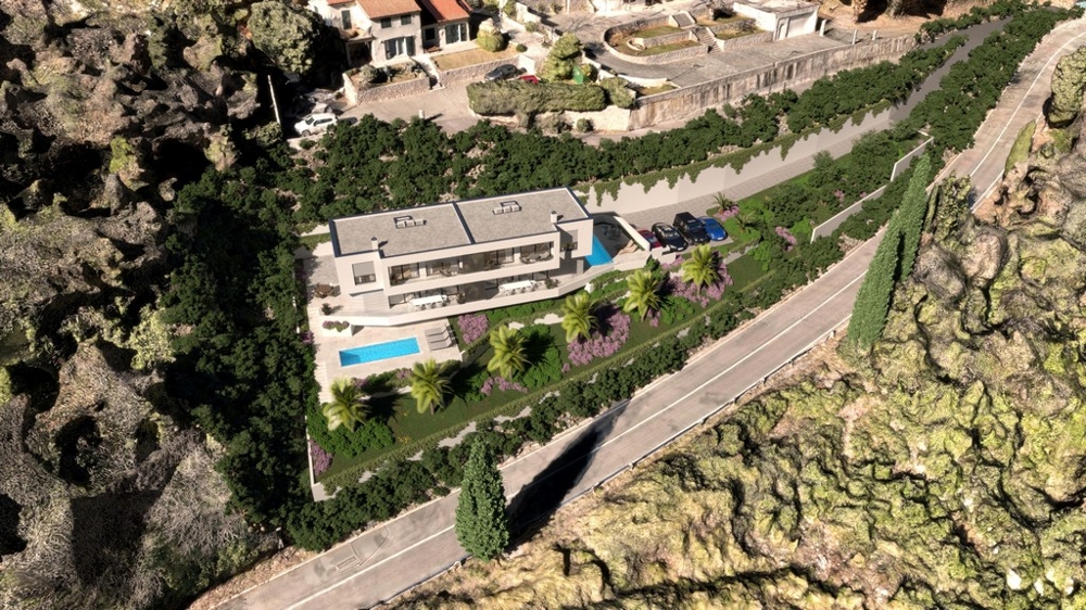 Vue aérienne du terrain avec bâtiment et piscine