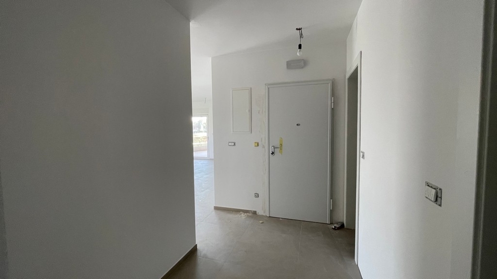 Couloir avec accès à la cage d'escalier