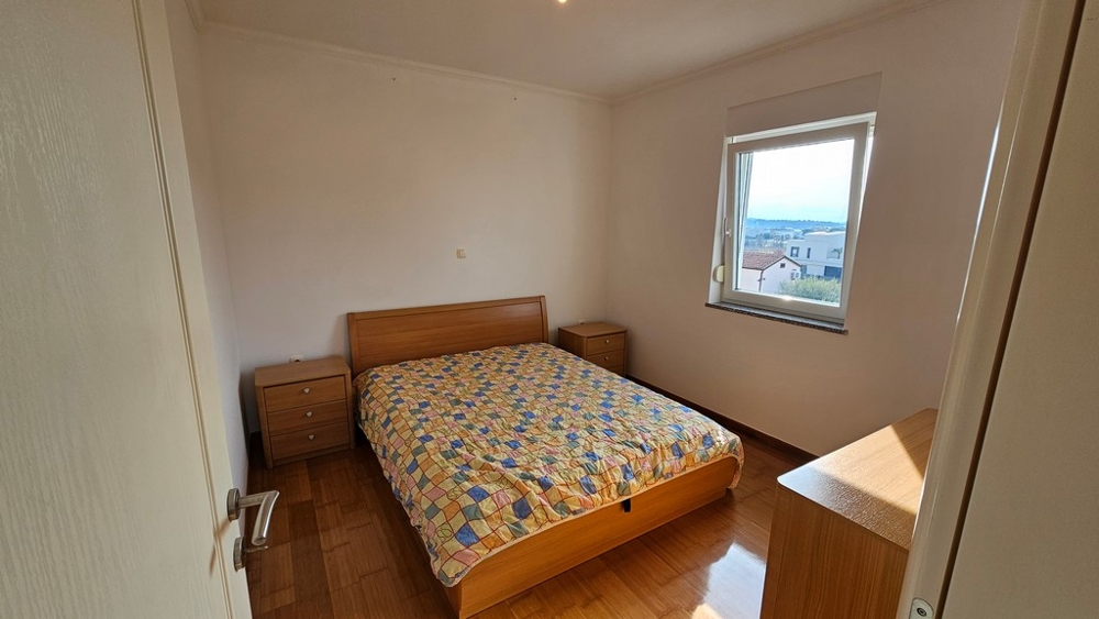 Chambre avec lit double et vue mer