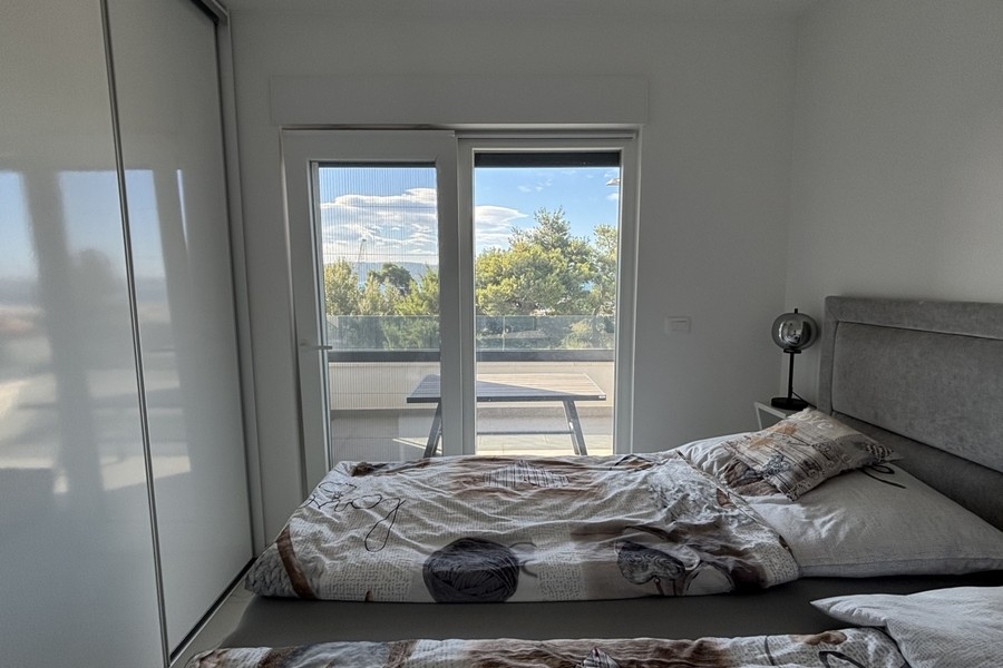 Chambre avec accès au balcon et vue mer