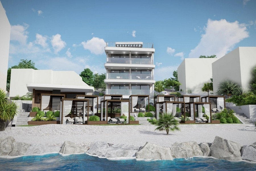 Immeuble d'habitation moderne en première ligne sur la mer avec espace plage en Croatie