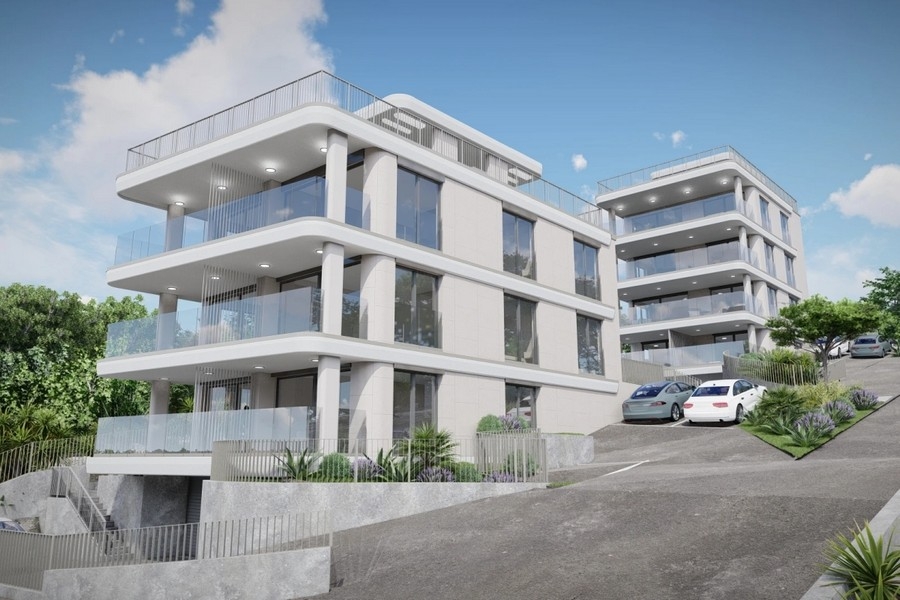 Immeuble collectif avec ascenseur et places de stationnement extérieures