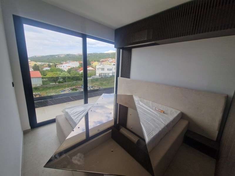 Chambre avec grande baie vitrée