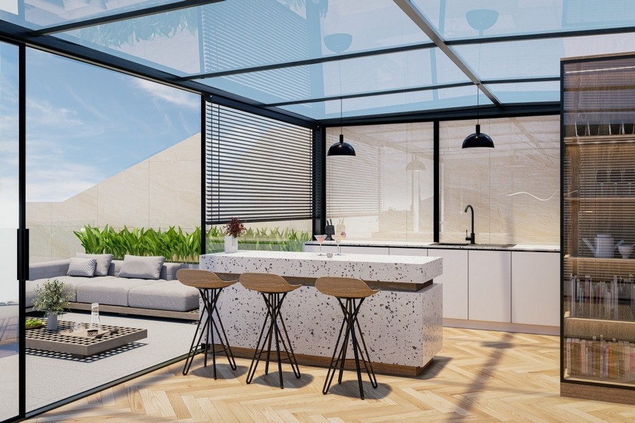 Cuisine extérieure couverte avec espace lounge et vue mer