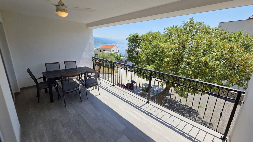 Terrasse couverte avec vue mer