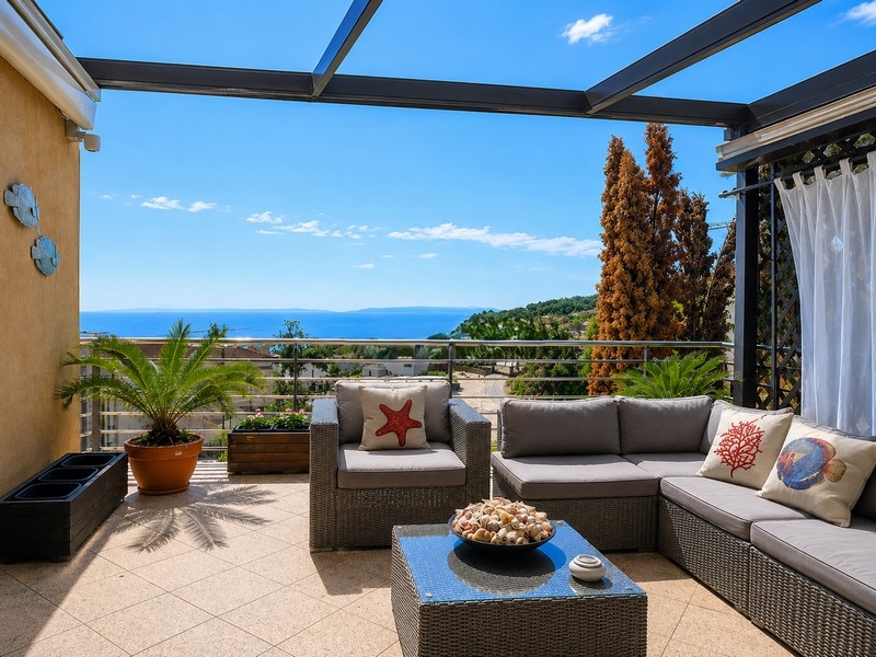Terrasse avec vue mer d'un appartement à Icici