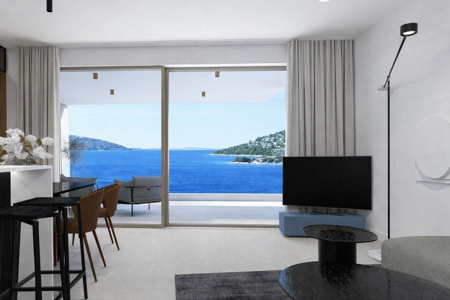 Séjour clair avec vue mer et accès à la terrasse