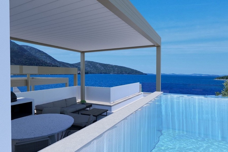 Terrasse couverte avec piscine et vue mer à Primosten