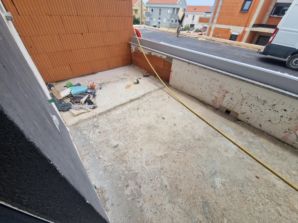 Terrasse couverte de l'appartement en rez-de-chaussée
