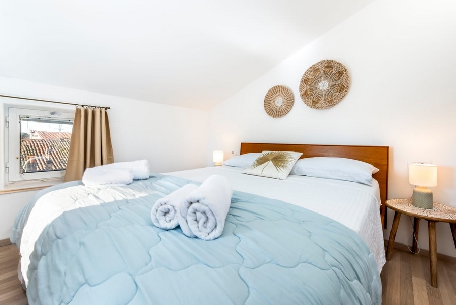 Chambre avec lit double dans un bien en Croatie