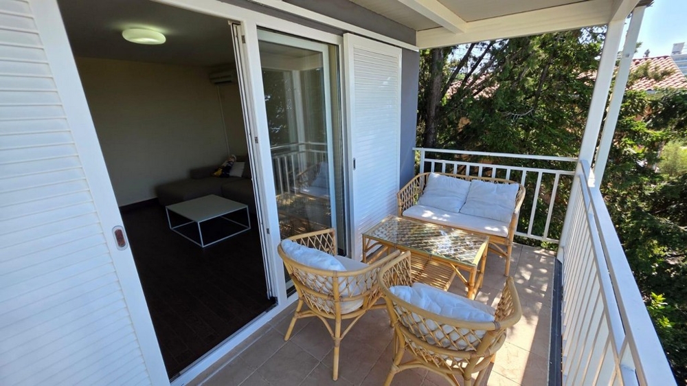 Balcon couvert avec coin salon