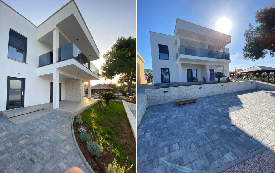 Villa moderne avec appartement du rez-de-chaussée et allée d'accès pavée
