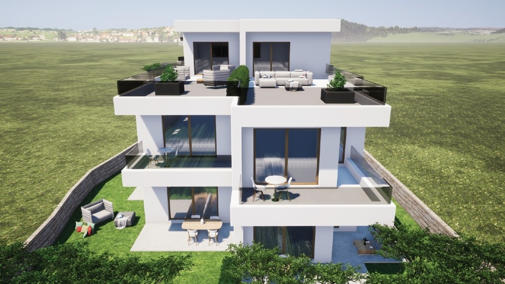 Construction neuve vue de face avec toits-terrasses à Tribunj