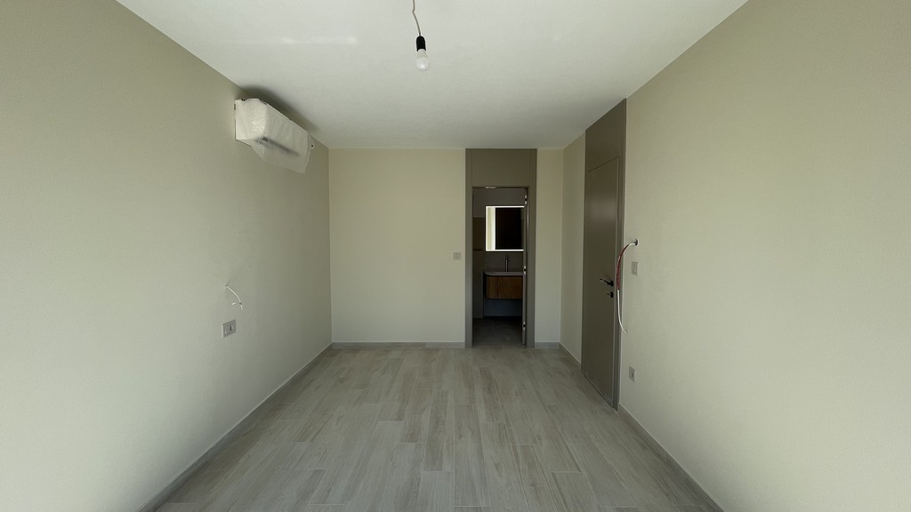 Grande chambre avec climatisation
