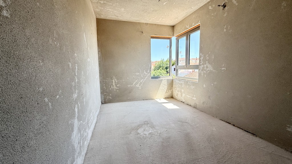 Chambre avec fenêtre d'angle