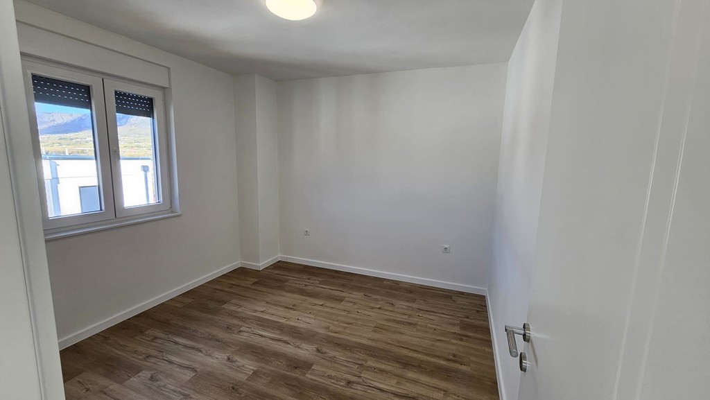 Chambre avec parquet en bois
