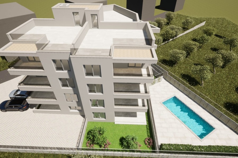 Bâtiment neuf vu d'en haut avec toitures-terrasses