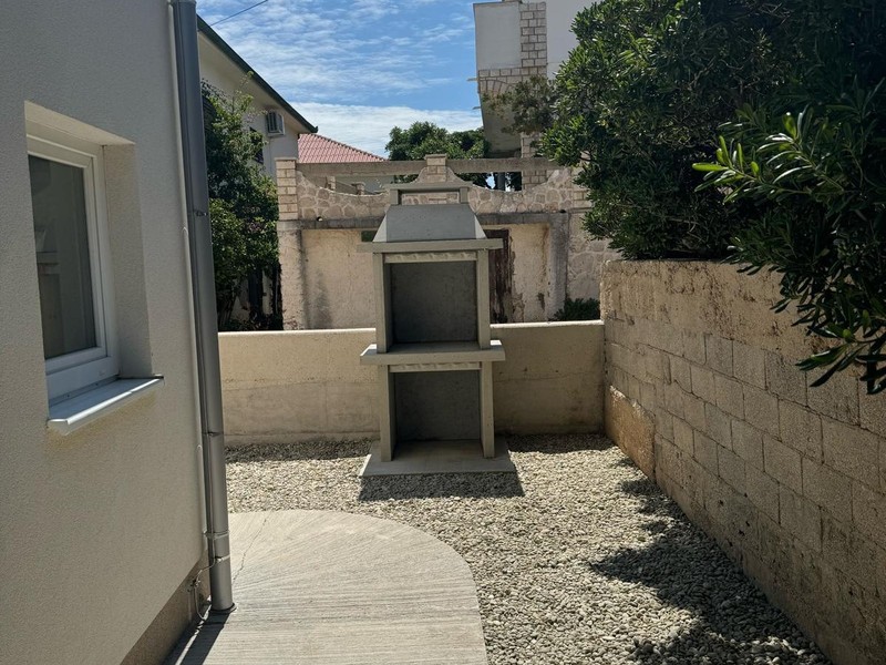 Espace barbecue dans la cour