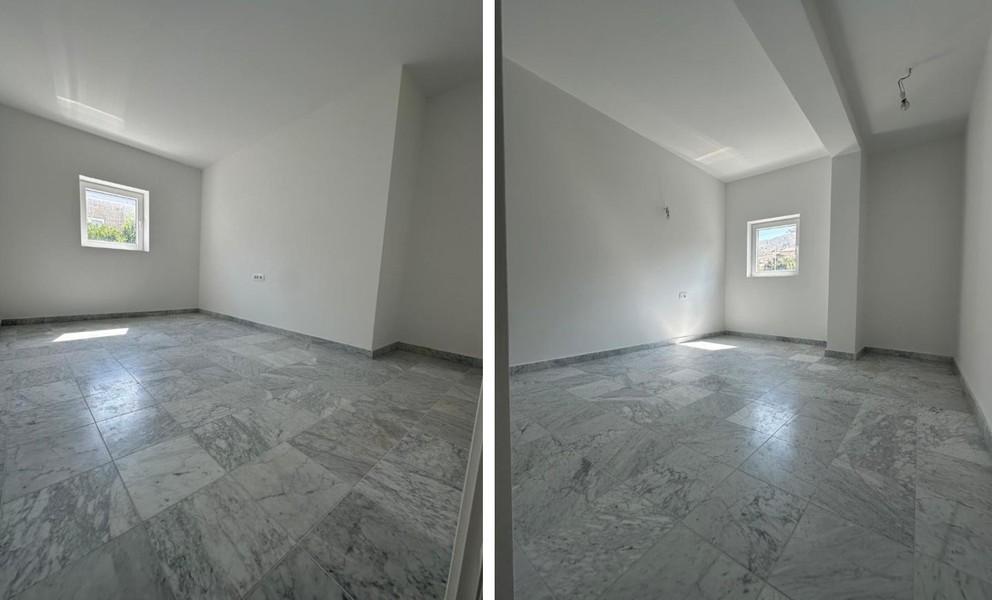 Chambre avec sol en marbre clair et fenêtre