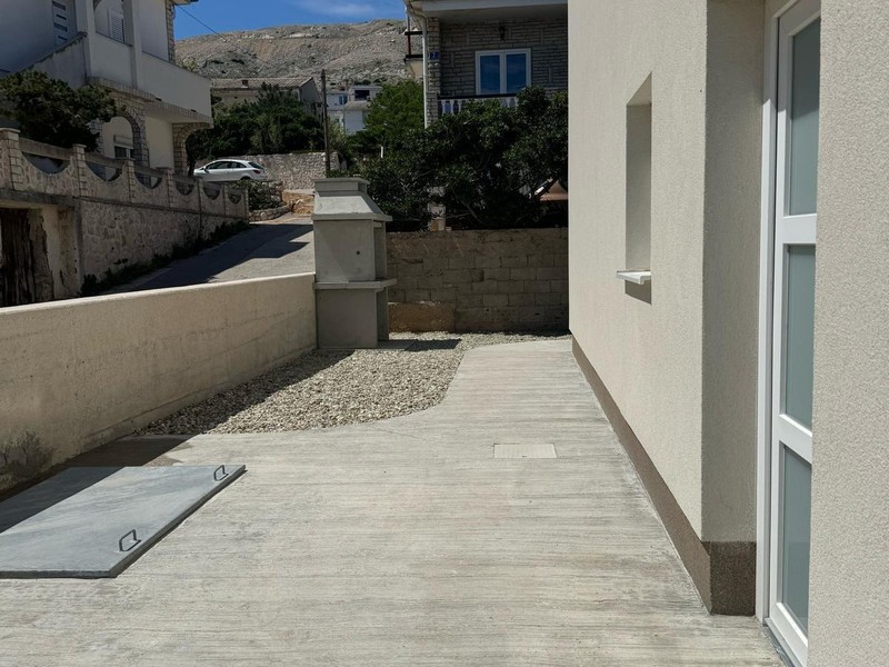 Accès à la maison avec surface de gravier