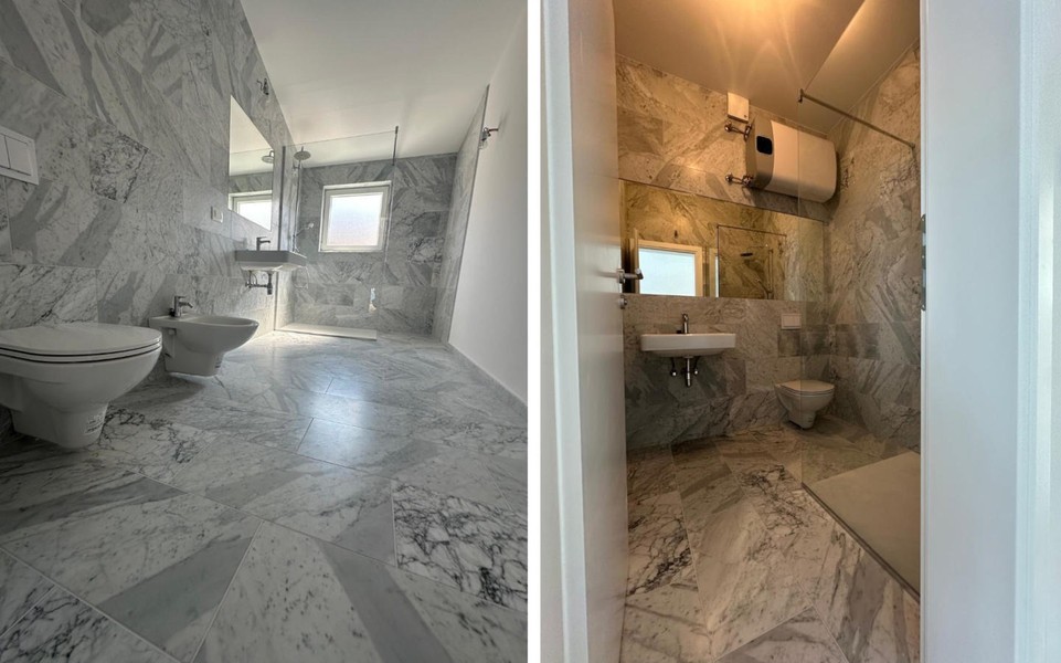 Salle de bain avec douche et lavabo