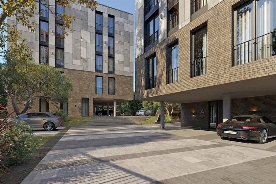 Accès et entrée de la résidence avec places de parking