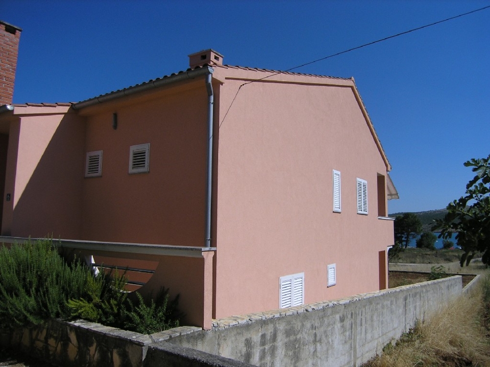 Maison près de la mer - H1260 arrière avec vue sur la mer.