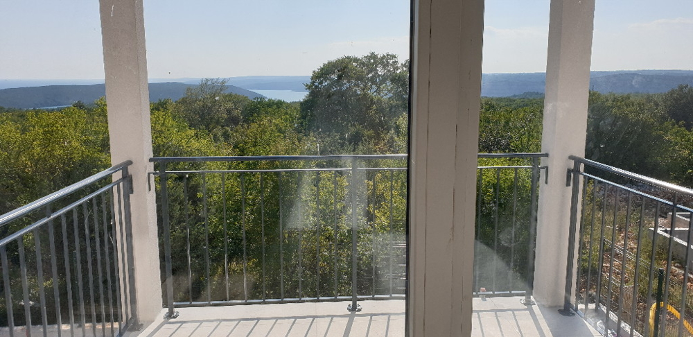 Maison neuve en pierre avec vue mer et piscine en Istrie à vendre - Panorama Scouting GmbH.