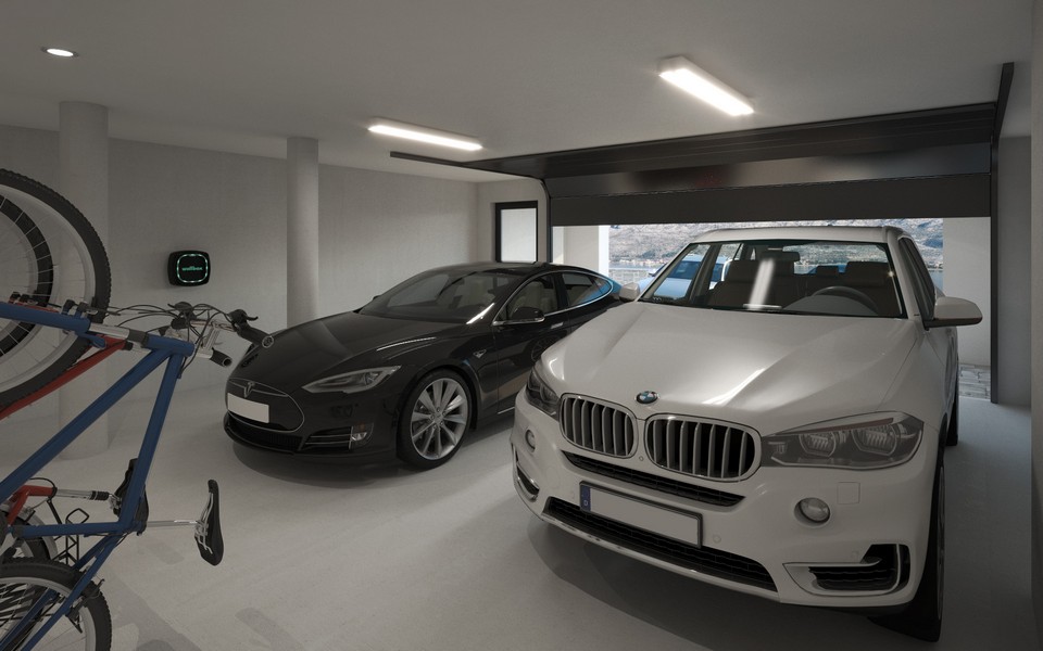 Visualisation du garage avec deux places de stationnement et des vélos