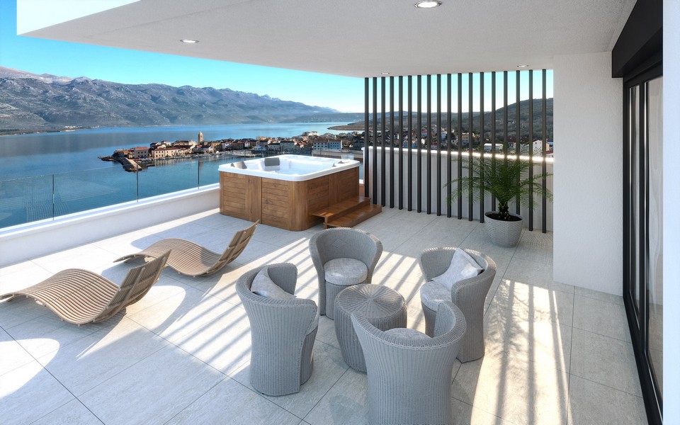 Visualisation de la terrasse avec jacuzzi et fauteuils en rotin
