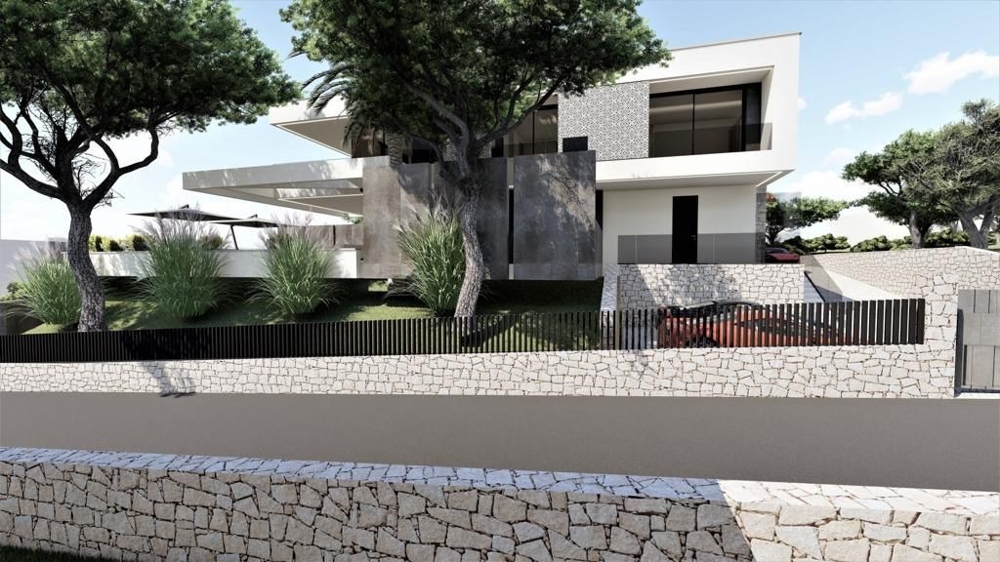 Visualisation de la villa derrière de vieux pins et un mur en pierre naturelle