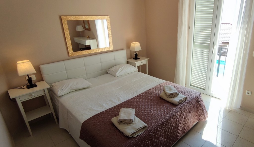 Chambre avec accès à la terrasse