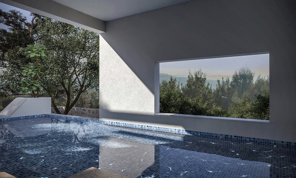 Vue intérieure d'une piscine couverte avec vue mer dans une villa en vente à Jezera, Murter, Croatie