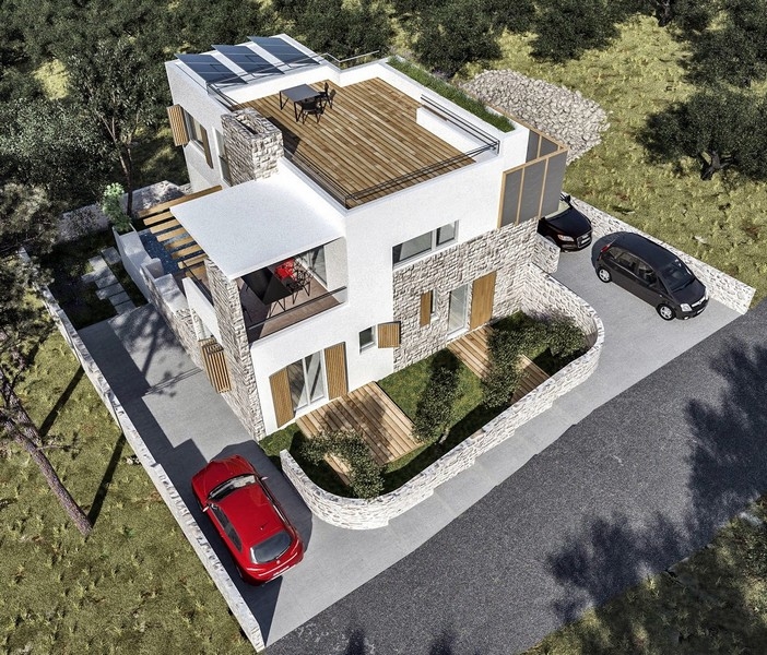 Vue arrière d'une villa moderne avec mur en pierre à vendre à Jezera sur l'île de Murter en Croatie